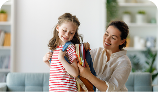 Woman helping her child get ready for school