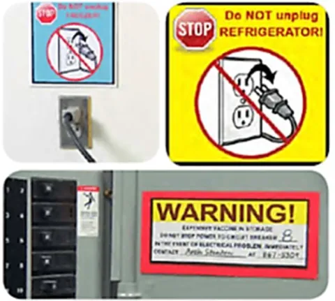 Warning labels for the vaccine storage units. They all prominently display the words "Warning" and "Do not unplug the freezer or refrigerator"