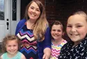 Woman with three children